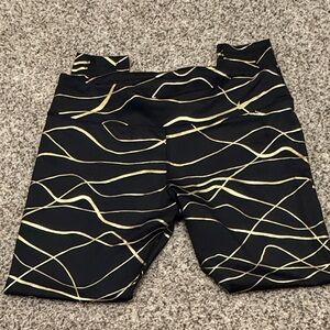 Nike Black Dri-FIT Athletic Shorts with Gold Accent
